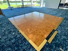 20x20 modular, used portable dance floor. Original hardwood with moving racks.