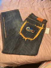 Vintage Australian COOGI Jeans Embroidered Orange Design 38x34