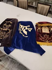 A GROUP OF THREE VELVET TORAH COVERS MANTELS AMERICAN