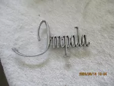 USED 1968 CHEVROLET IMPALA FRONT FENDER EMBLEM