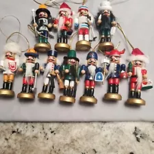 Vintage small wooden nutcrackers in costumes, christmas ornaments.