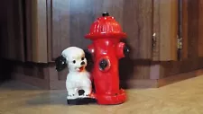 Dog Peeing On A Fire Hydrant Bank With Mexico On The Hydrant