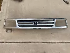 Grille For 1993-1998 Toyota T100 Chrome Shell OEM HAS SOME CRACKS