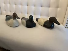 Three vintage duck decoys for sale