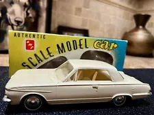 1963 Plymouth Valiant Coupe Promo 1:25 AMT Friction