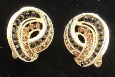 Up For Sale Are A Pair Of Vintage Crown Trifari Rhinestone Earrings. Clip On’s.