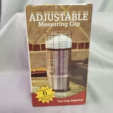 New In Box Adjustable Measuring Cup For Liquids Push Up Unbranded