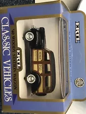 ERTL.CLASSIC 1940s FORD WOODY STATION WAGEN.NEW OLD STOCK,BOXED,CORGI 1/43 scale