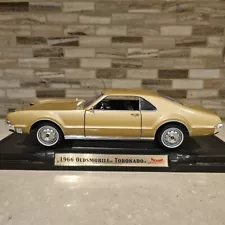 Road Signature 1/18 Gold 1966 Oldsmobile Tornado with Pop Up Headlights No Box