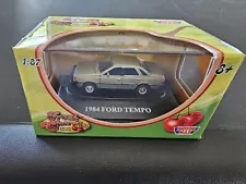 MotorMax Fresh Cherries 1984 Ford Tempo Tan HO Scale 1:87