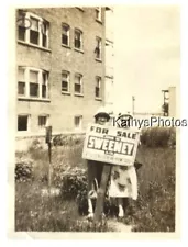 FOUND B&W PHOTO H_3429 TWO PRETTY WOMEN BEHIND A REAL ESTATE "FOR SALE" SIGN