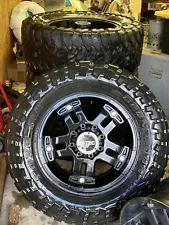 TRUCK TIRES AND RIMS 37“ TOYO TIRES SITTING ON 20 INCH RIMS FOR CHEVY2500/3500