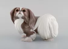 Sveistrup Madsen for Bing & Grøndahl. Porcelain figure. Standing Pekingese.