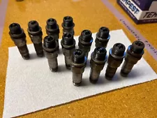 12 Used Tempest Spark Plugs - UREM40E