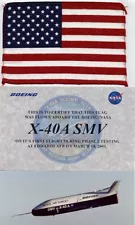 FLAG FLOWN ON BOEING X-40A SMV / DRONE DURING FIRST FLIGHT