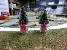 2- 2" POTTED SPRUCE TREES W/SNOW