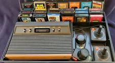 Atari 2600 System Bundle with Console, 25 Games Joysticks Paddles & Storage Case