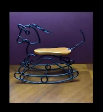 DECORATIVE METAL FRAMED WITH WOOD SEAT OF ROCKING HORSE