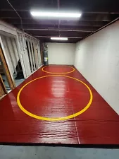 Used Full Size Wrestling Mat. Includes 2 full circles.