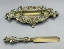 ORNATE ANTIQUE VICTORIAN CAST METAL LETTER OPENER WITH STAND