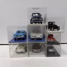 Model Cars Collection in Display Cases