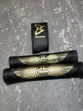 SE BIKES BEASTMODE PAD SET BLACK AND GOLD WITH SE WINGS MARSHAWN LYNCH BMX