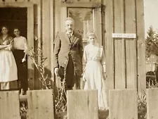 RPPC Sad Older Couple with Old Home for Sale Antique Real Photo Postcard c1910