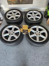 2003 Nissan 350z Performance set of 4 stock wheels. Original lugs are included.