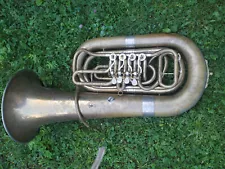 Very big old German Bb tuba (Kaiserbass?) with 4 rotary valves & garland!