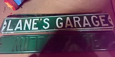 Steel! street sign embossed letters, Lanes garage