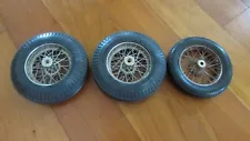 3 wire spoke wheels and tires 1 front 3 3/4 " diameter 2 rear 4 1/8"diameter