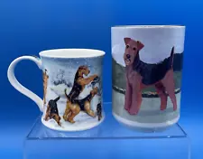 PAIR OF AIREDALE TERRIER DOG COFFEE MUGS, ONE BY ANN CURRAN, DUNOON, ENGLAND