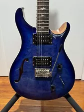 The PRS SE Custom 22 semi-hollow limited-run electric guitar. Blue Burst