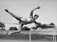 American athlete Bob King clears bar trains for a high jump event, Old Photo