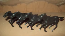 Lot of four original vintage Marx 54mm bareback running horses in black