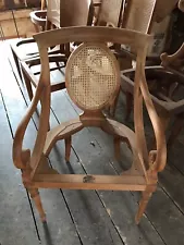 A collection of cane custom made chairs by Adolph Genovese. F&G Fine Furniture