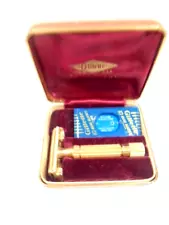 old gold colored Gillette Aristocrat safety razor with box