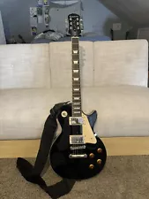 Epiphone Les Paul Standard Black Off White Electric Guitar With Roadrunner Case.