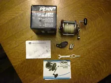 Penn 209M Level Wind Fishing Reel w/ Box, Wrench, Rod Clamp, Parts List, Manual