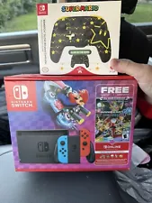 Nintendo Switch Neon Red and Neon Blue Joy-Con Console + + Mario Controller