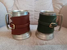 Pair of Pewter Mugs. Leather wrap and Clear Bottom