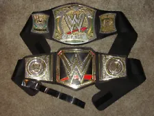 LOT 2 WWE WRESTLING BELTS 2010 MON NIGHT RAW CHAMPION 2014 WORLD HEAVYWEIGHT