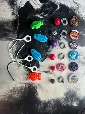 assorted beyblade burst, 6 beyblades and 4 launchers and ripcords