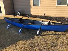 Old Town Saranac 146 DLX canoe with paddles, used once, excellent condition
